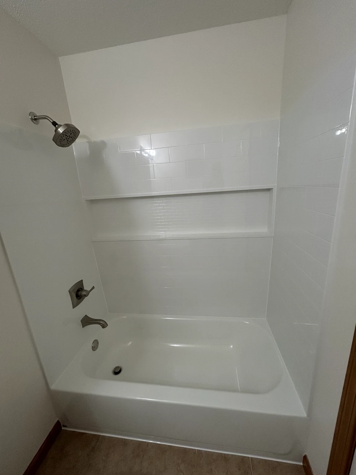 Bathroom after complete tub surround renovation