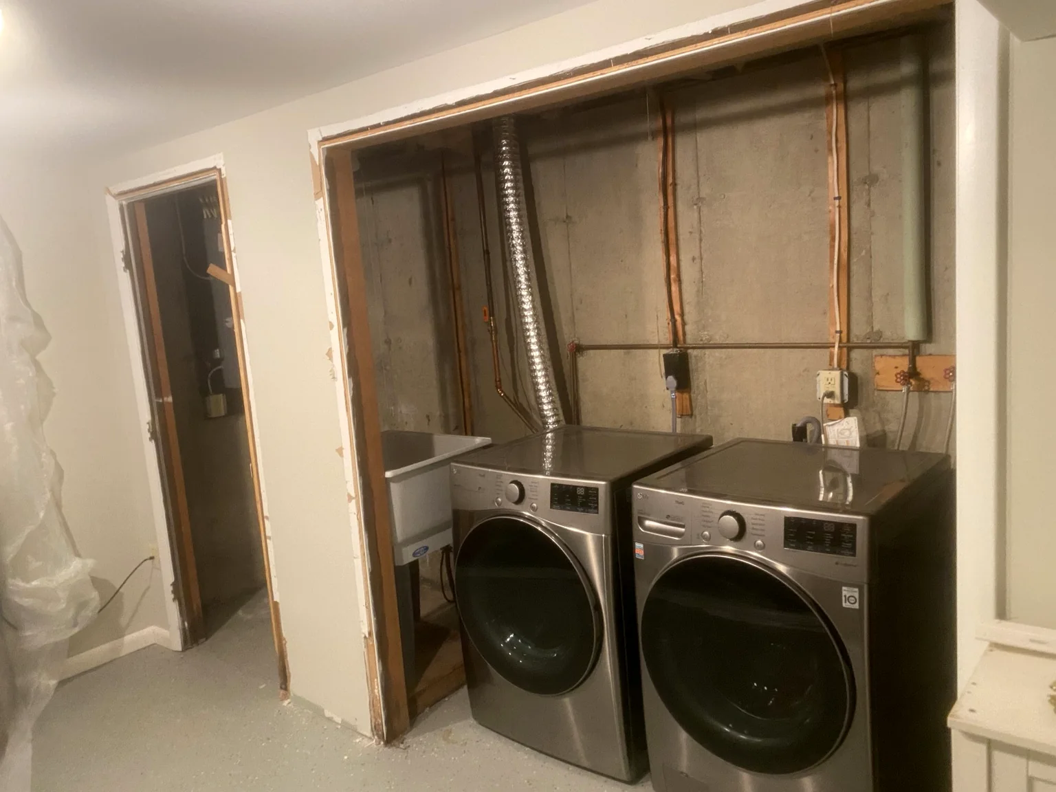 Laundry area with open wall before finishing