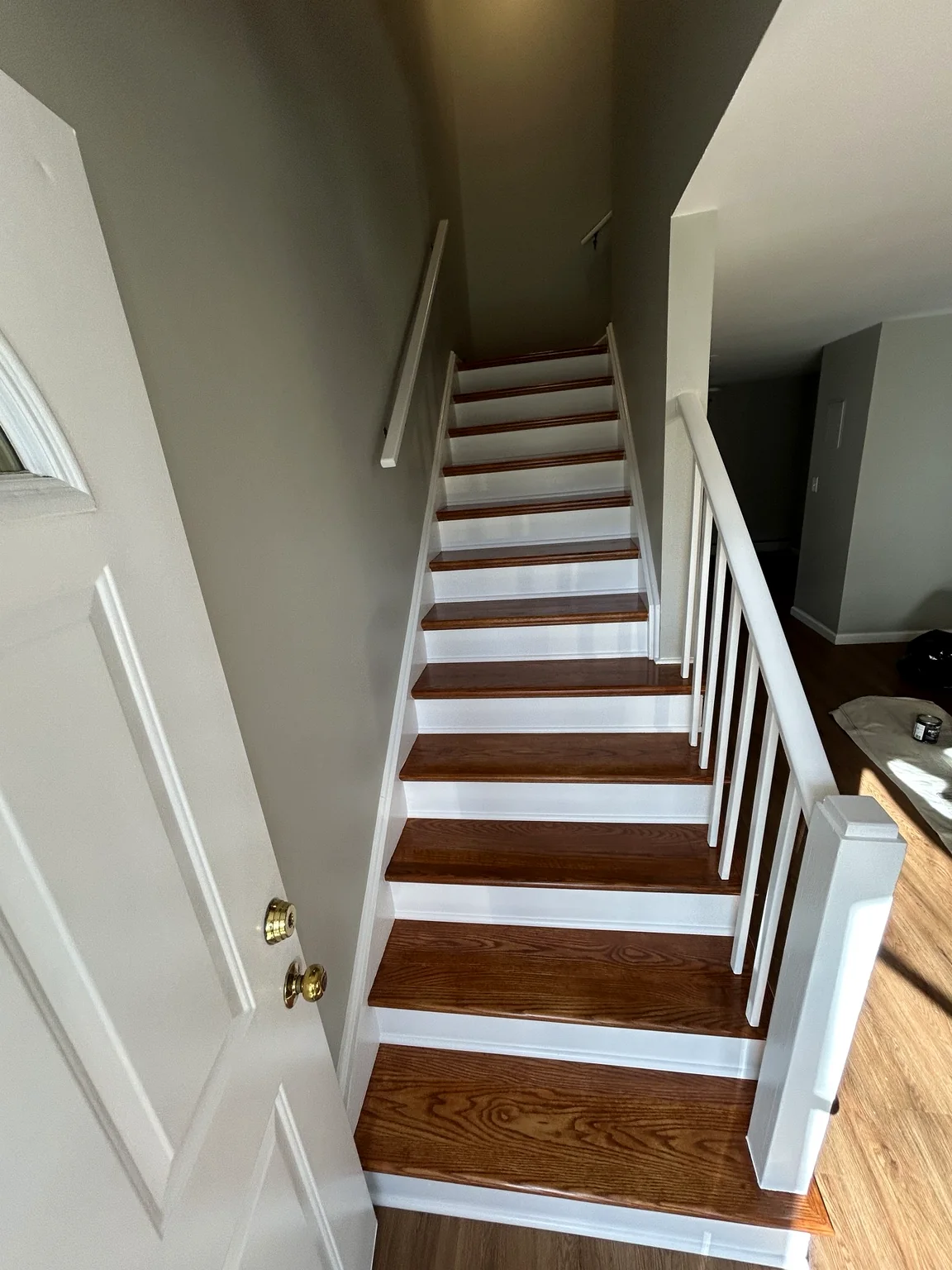 Hardwood staircase after carpet removal and refinishing